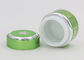 Los pequeños envases de cristal de la loción para bate y el color verde del cuidado de piel de las lociones